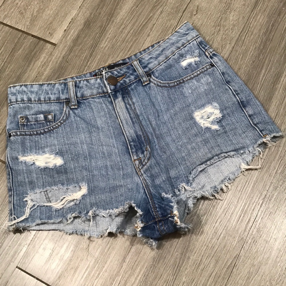 BDG “High Rise Cheeky” Distressed‎ Light Wash Denim Shorts size 28